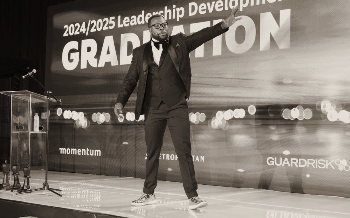 Lebo Mokoena mid-delivery at a corporate graduation ceremony