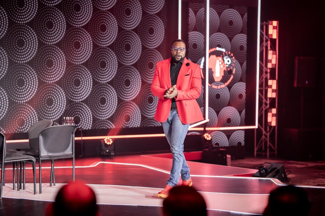 Working the floor in front of a seated audience