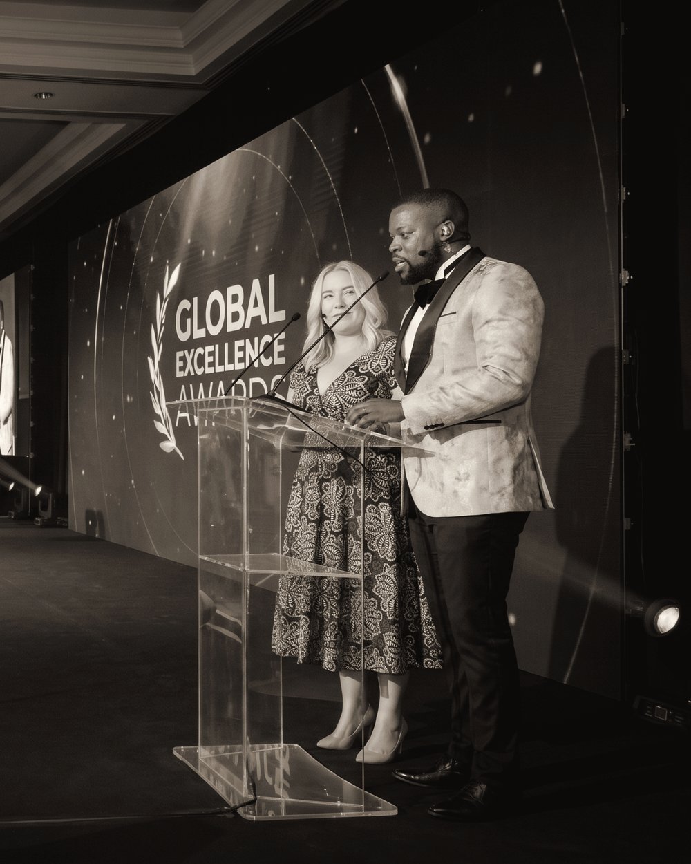 Lebo Mokoena hosting an awards evening from the podium